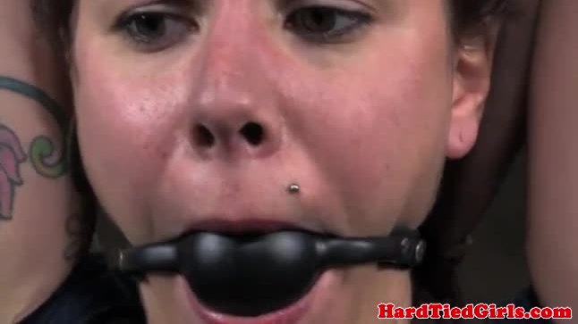Open mouth gagged restrained brunette